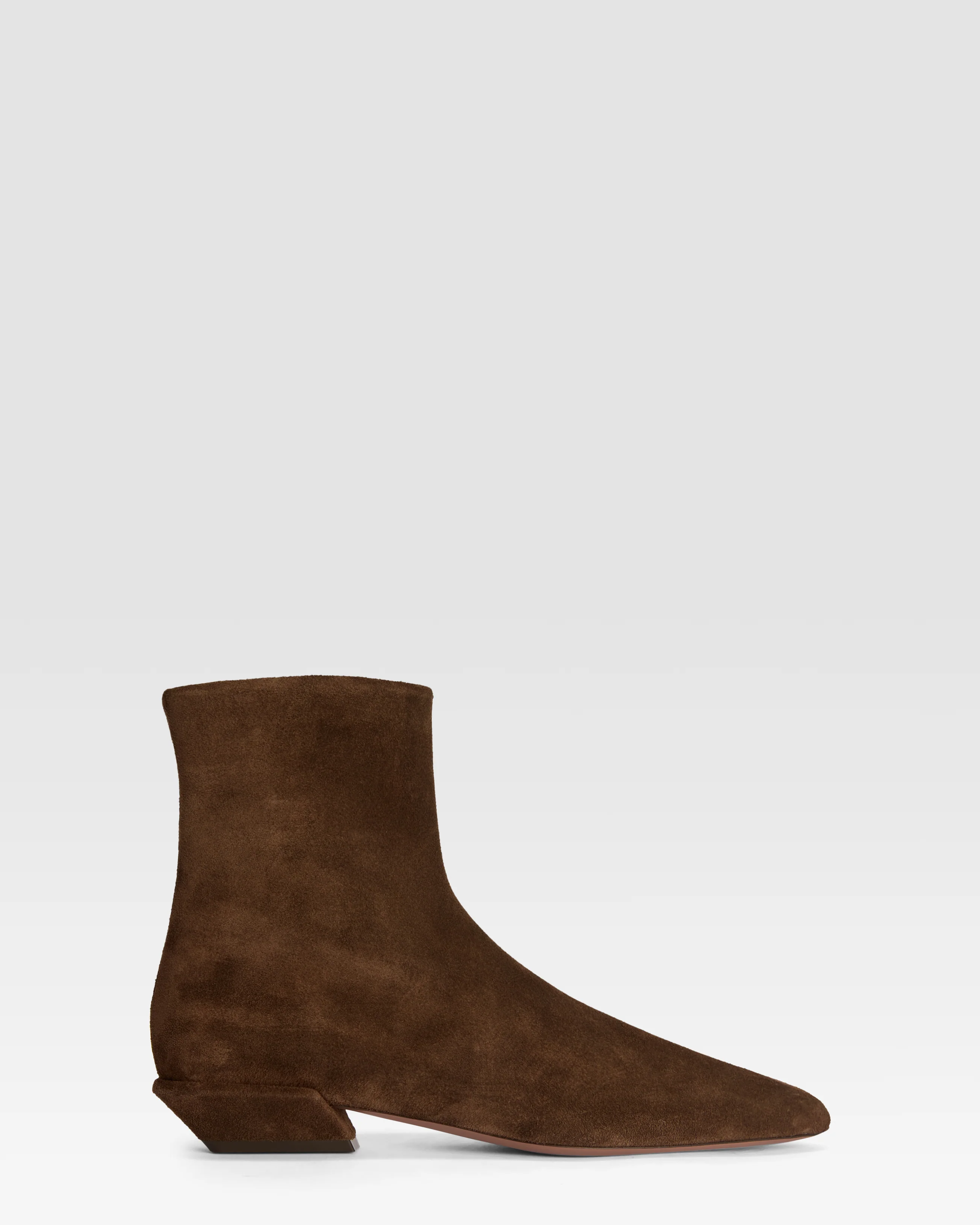 Ankle boots in ebony calf suede leather